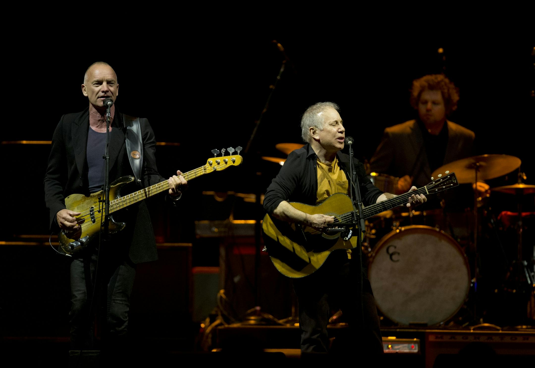 Longtime New York neighbors Sting and Paul Simon decided to hit the road and tour together. The Paul Simon & Sting: On Stage Together tour stopped at Xcel Energy Center in St. Paul Sunday night, February 23, 2014. Sting, left, and Paul Simon early in their set Sunday night at Xcel Energy Center.