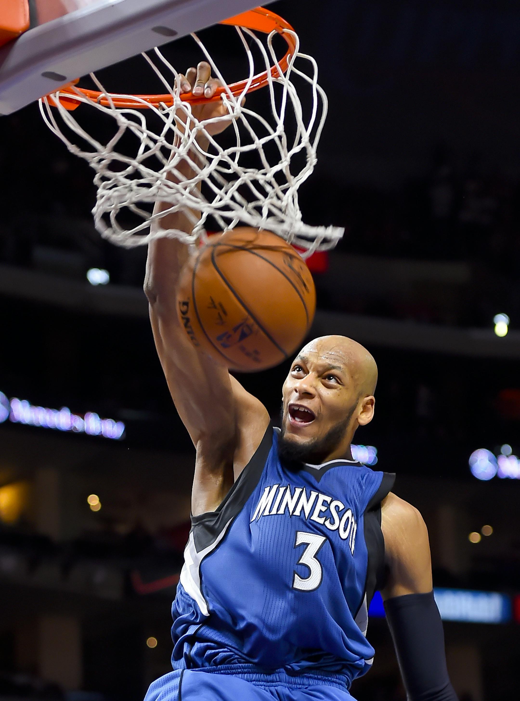 Minnesota Timberwolves forward Adreian Payne dunks in the second half of an NBA basketball game against the Los Angeles Clippers, Monday, March 9, 2015, in Los Angeles. The Clippers won 89-76. (AP Photo/Gus Ruelas)