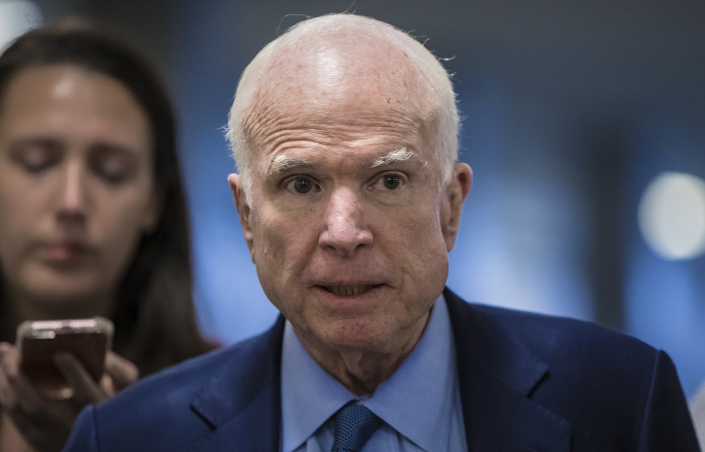 Sen John McCain, R-Ariz., chairman of the Senate Armed Services Committee, returns to his office after a series of votes at the Capitol in Washington, Thursday, Oct. 19, 2017.