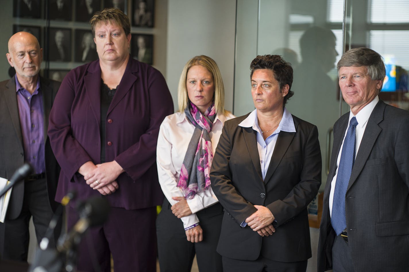 At the law offices of Fafinski Mark & Johnson, former UMD women basketball coach Annette Wiles, softball coach Jen Banford, and hockey coach Shannon Miller are bringing suit against the Board of Regents of the University of Minnesota. Two of the lawyers are Donald Mark Jr.(blue tie) and Dan Siegel(purple shirt) .] Richard Tsong-Taatarii/rtsong-taatarii@startribune.com