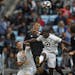 Jan Gregus (8) and Ike Opara (3) of the Loons clashed with D.C. United's Ulises Segura (8).