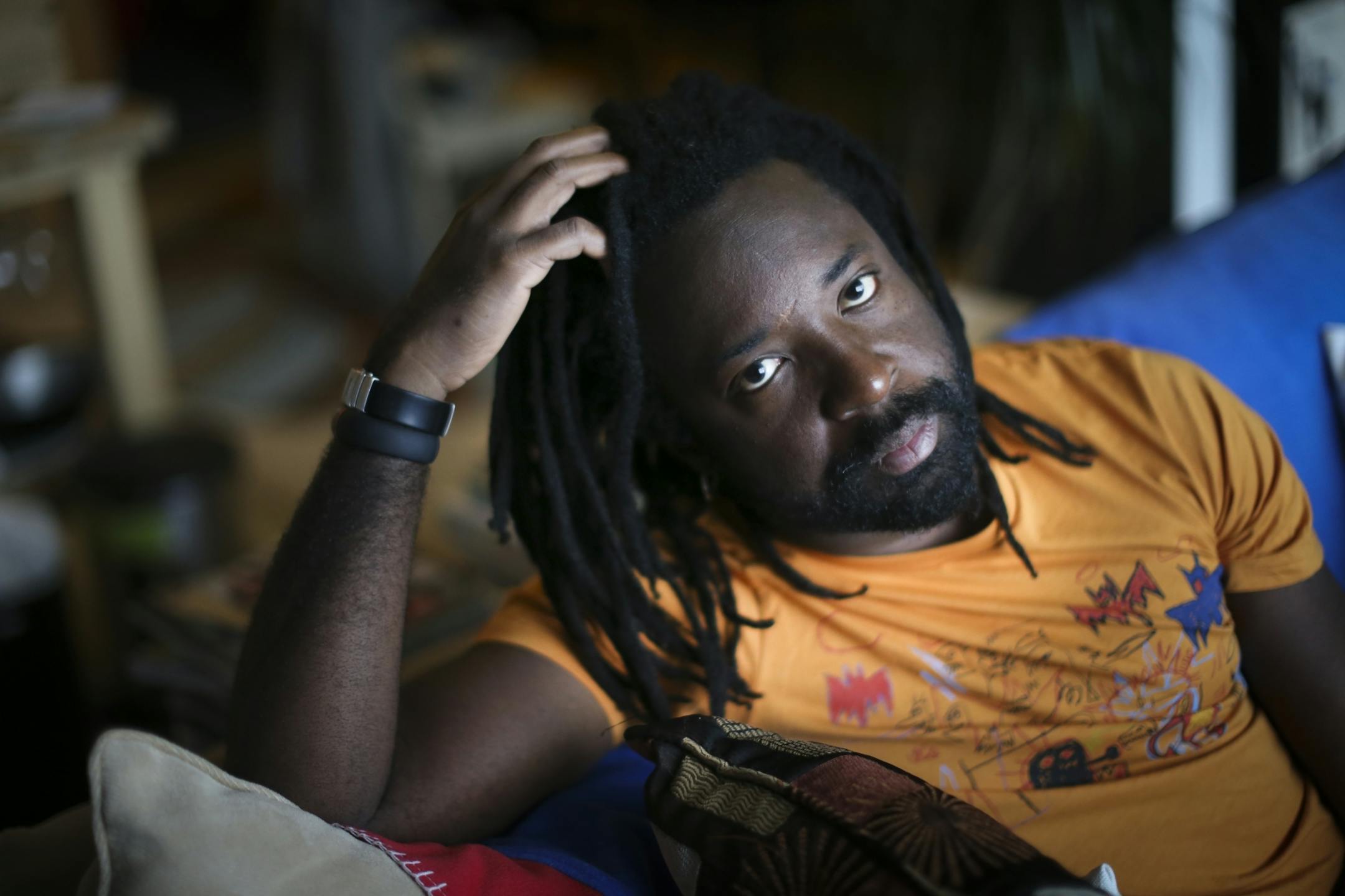 Author Marlon James photographed in his studio apartment on Friday, October 3, 2014 in Minneapolis, Minn.