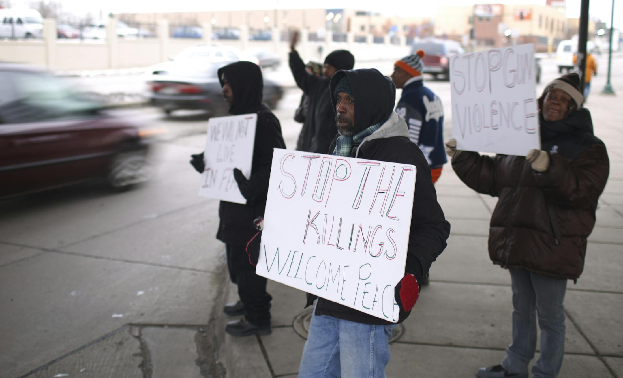 A small group of demonstrators held signs beneath the Lake St. LRT station Monday afternoon. ] JEFF WHEELER ‚Ä¢ jeff.wheeler@startribune.com A handful of demonstrators, led by Pastor Harding Smith of Minnesota Acts Now, held signs and chanted, calling for an end to violence beneath the Lake St. LRT station Monday afternoon, December 8, 2014. A man was stabbed to death at the station over the weekend.