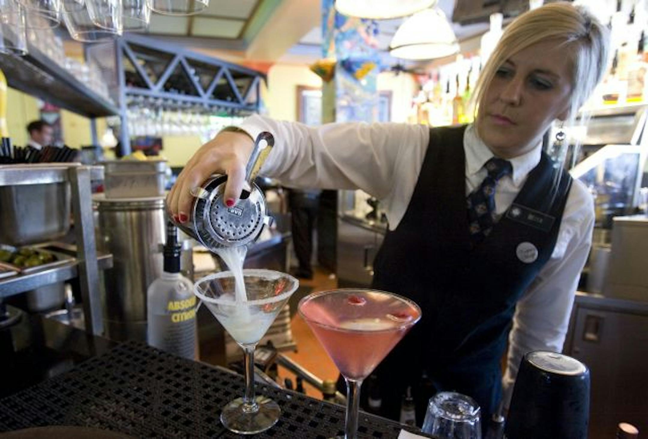 Bartender Becca Jones mixed drinks at the Oyster Bar in Salt Lake City. Some unusual alcohol regulations still exist; for example, you can't have two cocktails in front of you at once.
