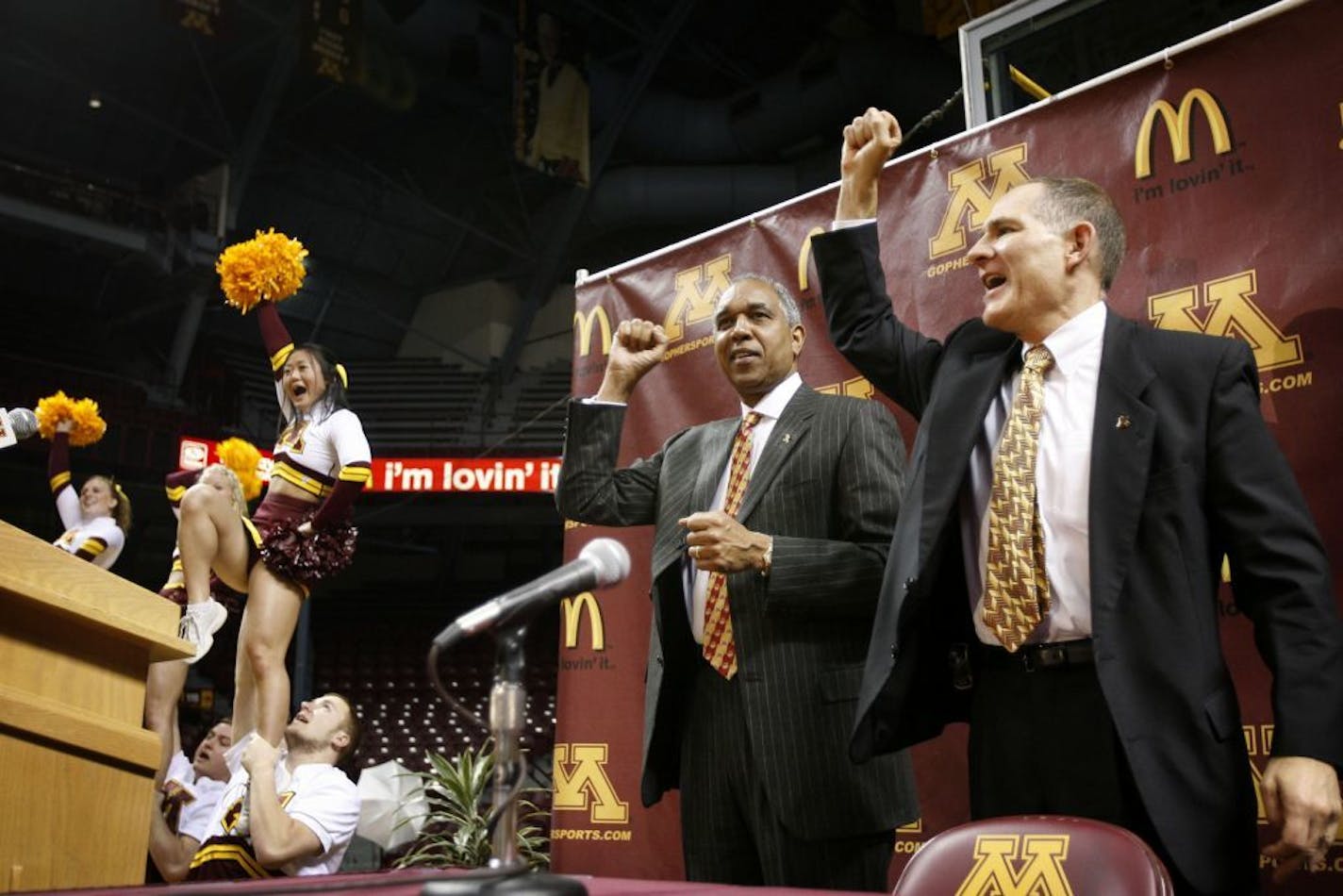 Tubby Smith and former Gophers athletic director Joel Maturi pumped their fists as the Minnesota Rouser was played at the end of a press conference introducing Smith when he was hired in 2007.