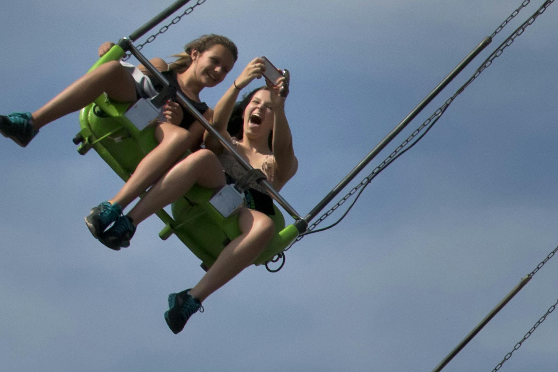A ride to remember: This selfie should help these riders to never forget their time on the Sky Flyer at the State Fair midway.