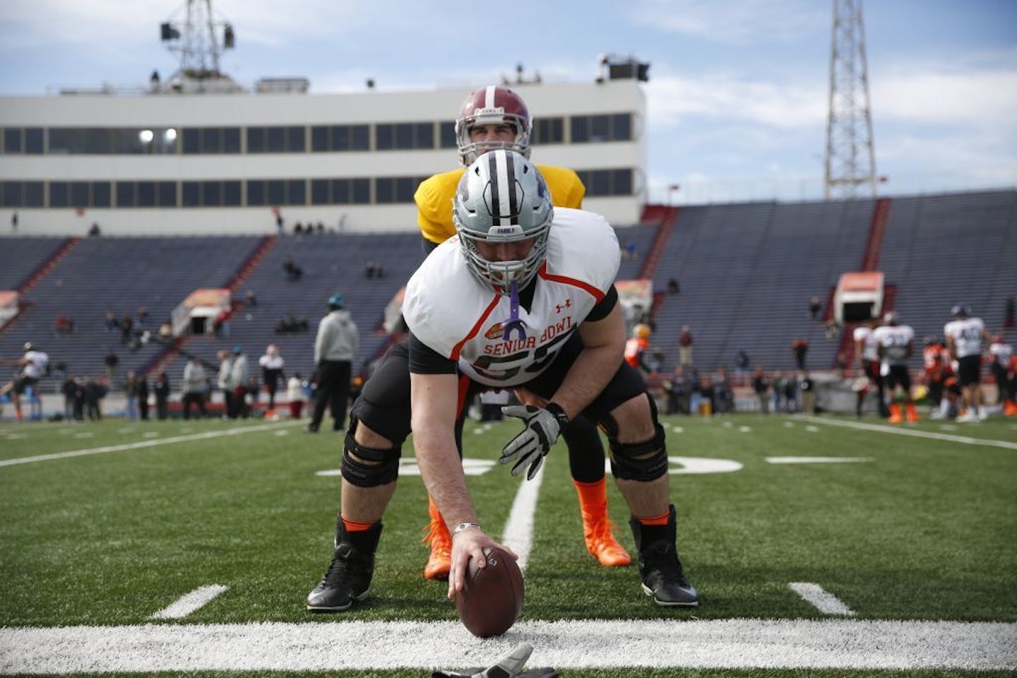 Kansas State's Cody Whitehair (55) runs through drills during NCAA college football practice for the Senior Bowl,