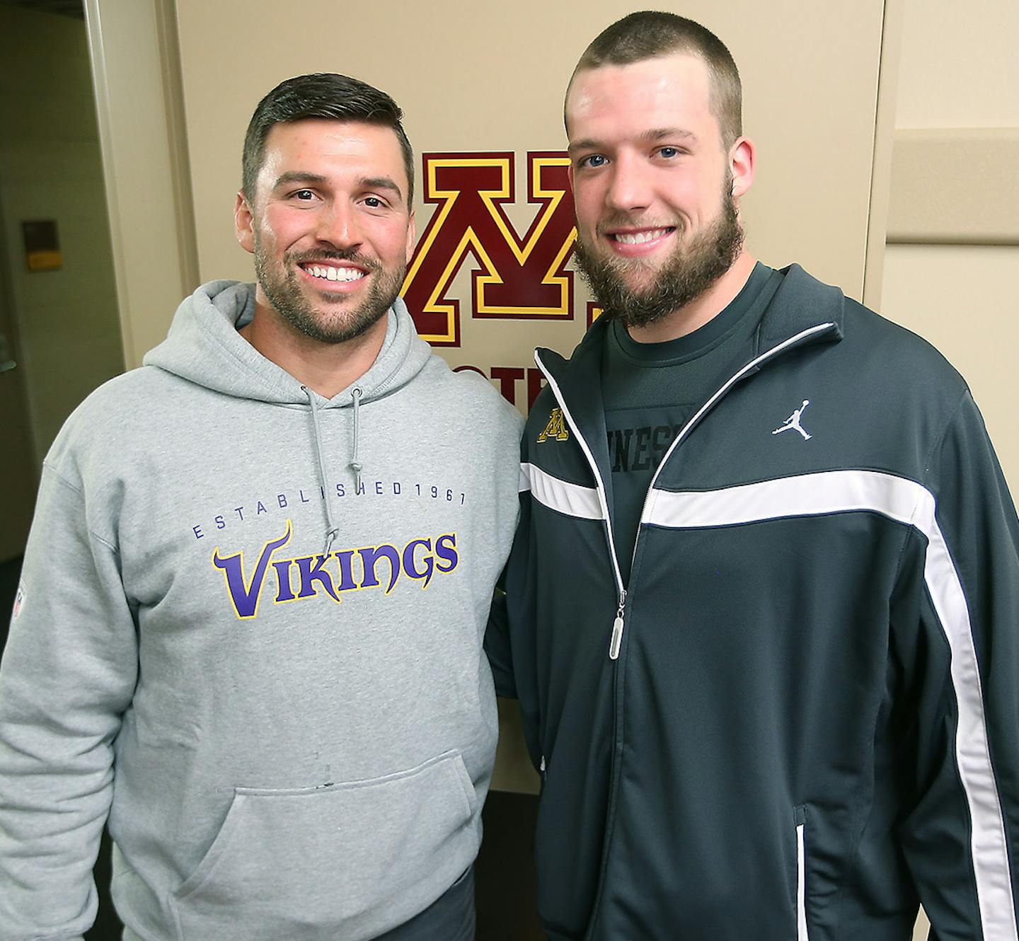 The Minnesota Gophers quarterback Mitch Leidner stood with mentor, Minnesota Vikings practice squad quarterback Chandler Harnish after their 39-38 win over the Purdue Boilermakers, Saturday, October 18, 2014 at TCF Stadium in Minneapolis, MN. ] (ELIZABETH FLORES/STAR TRIBUNE) ELIZABETH FLORES &#x2022; eflores@startribune.com