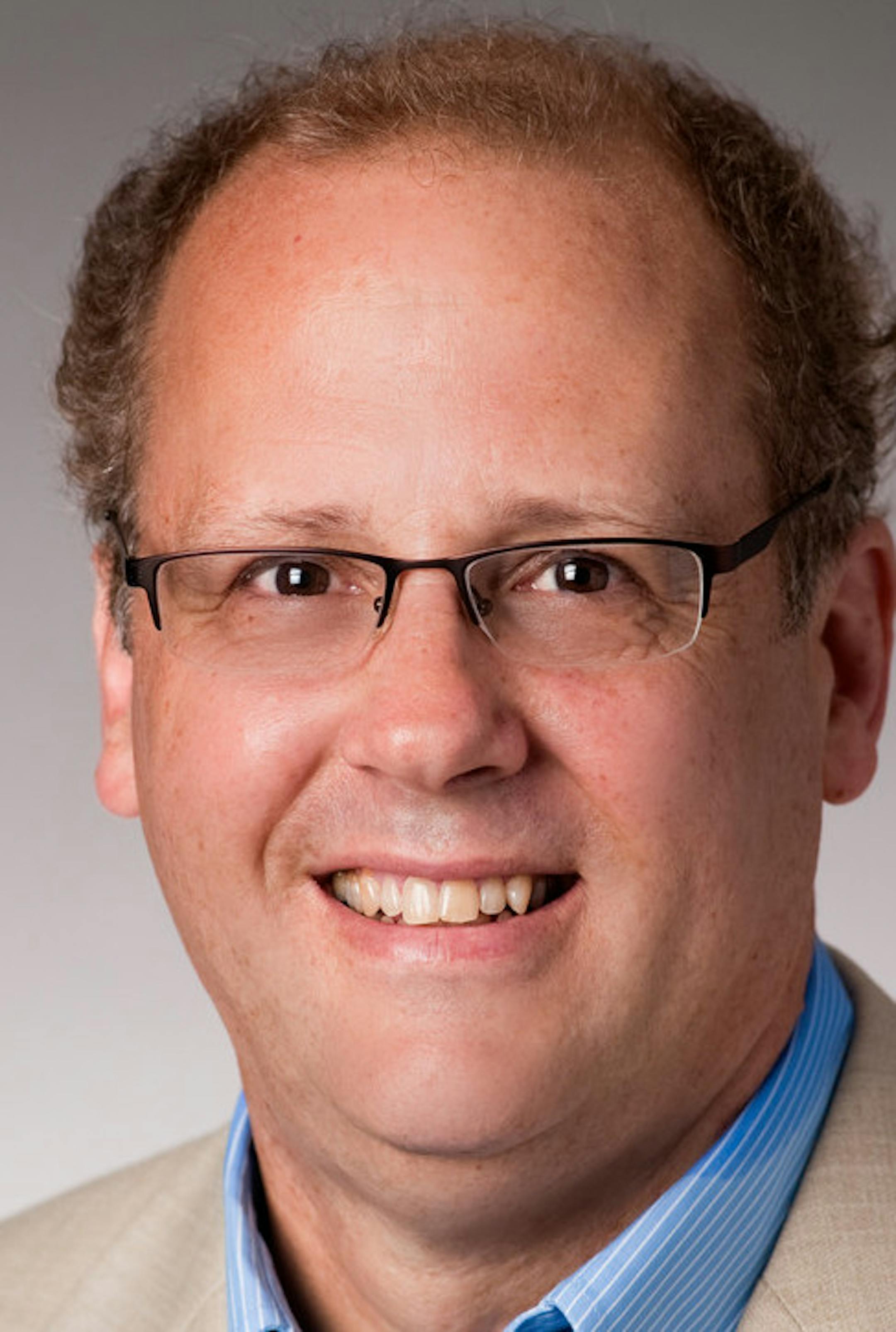 Studio portrait of Mark Spriggs, chair of the Entrepreneurship department of the Opus College of Business, taken July 15, 2010.