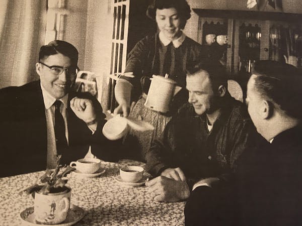 Mishael Emilio Hernandez and future Minnesota Gov. Al Quie shared a smile while Gretchen Quie poured coffee at the Quie home in this 1956 photo.