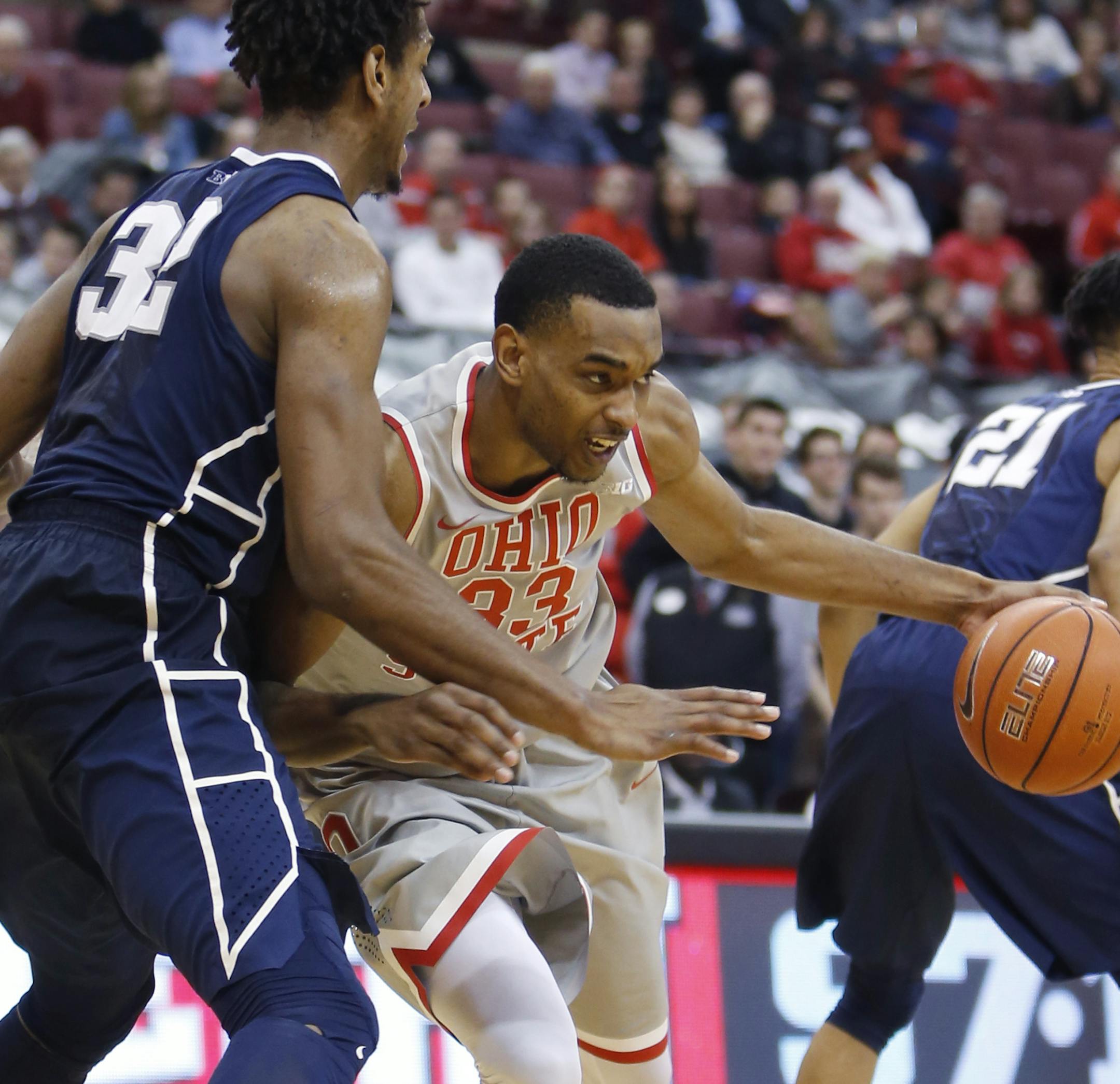Ohio State's Keita Bates-Diop, right, drives the lane against Penn State's Jordan Dickerson during the second half of an NCAA college basketball game, Monday, Jan. 25, 2016, in Columbus, Ohio. Ohio State defeated Penn State 66-46. (AP Photo/Jay LaPrete)
