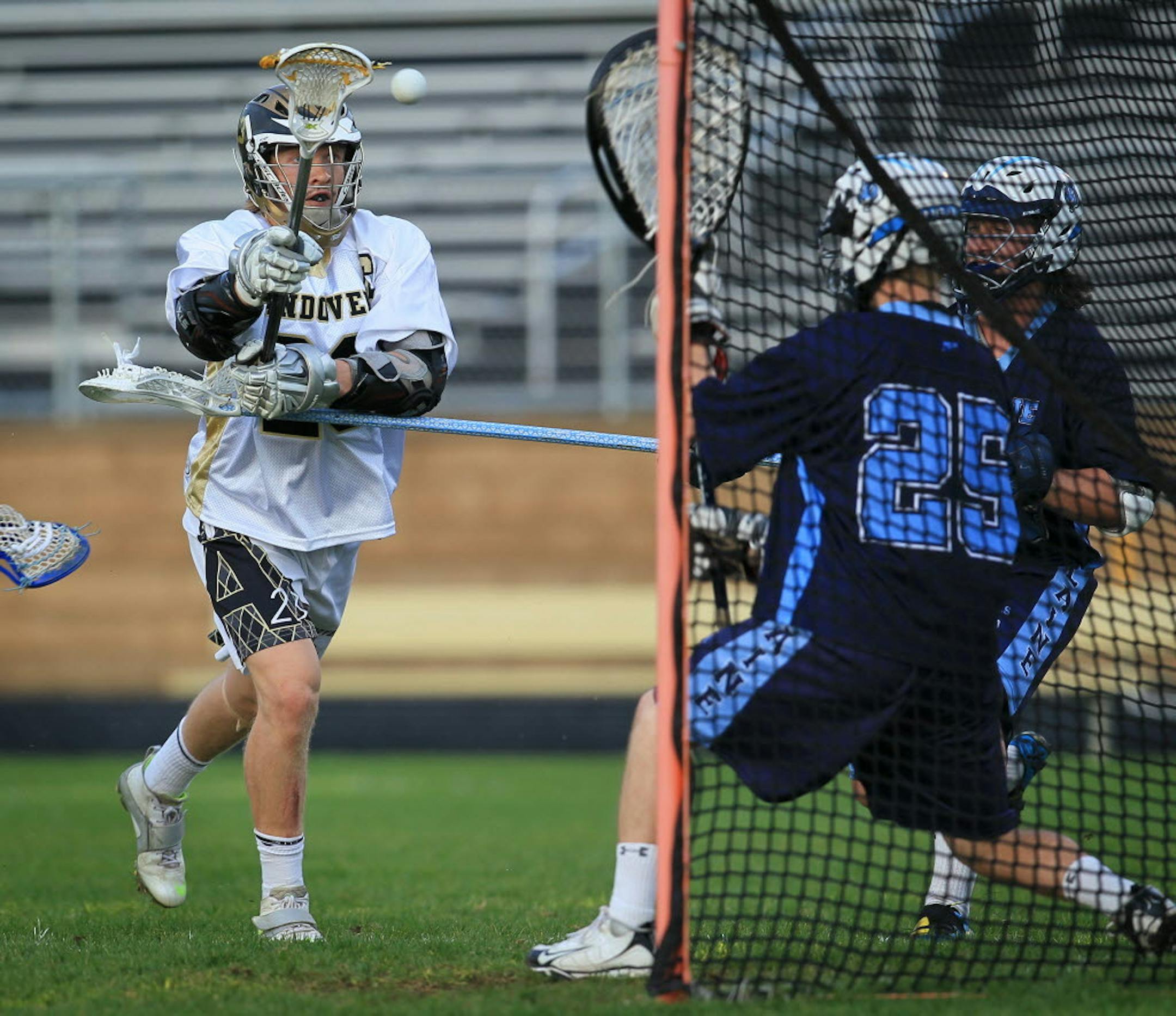 Andover's Jake Harmon scored a point with an assist from Nick Tollinger (not pictured) during the first half of a recent game against Blaine.
