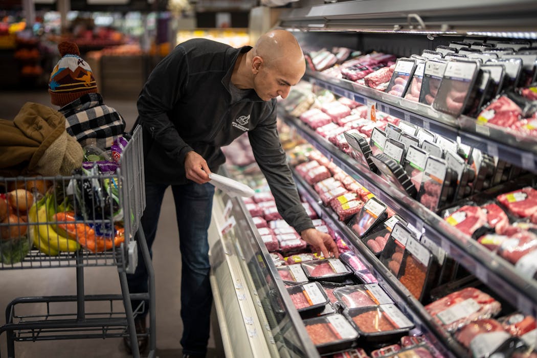 The Minneapolis Fed’s Neel Kashkari shopped at a Lunds & Byerlys in Wayzata on Jan. 7. “A lot of the prices that we’re seeing now are probably going to be with us,” he said. 