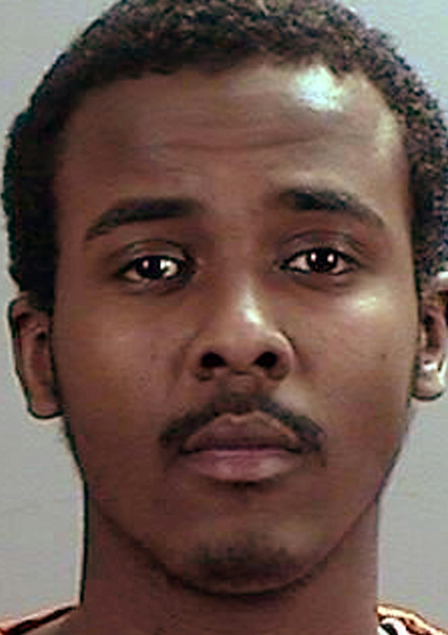 FILE - This undated file photo provided the Sherburne County Sheriff's Office in Elk River, Minn., shows Abdirahman Daud, of Minnesota. Daud was sentenced at U.S. District Court in Minnesota on Wednesday, Nov. 16, 2016, to 30 years in prison for conspiring to join the Islamic State group in Syria. (Sherburne County Sheriff's Office via AP, File)