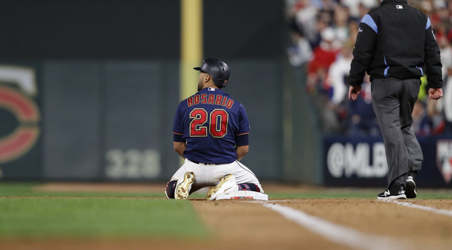 Minnesota Twins right fielder Eddie Rosario (20) stayed on his knees after being thrown out at first base in the fifth inning. ] LEILA NAVIDI &#x2022; Leila.navidi@startribune.com The Minnesota Twins met the New York Yankees in Game 3 of their American League Division Series Monday October 7, 2019 at Target Field.