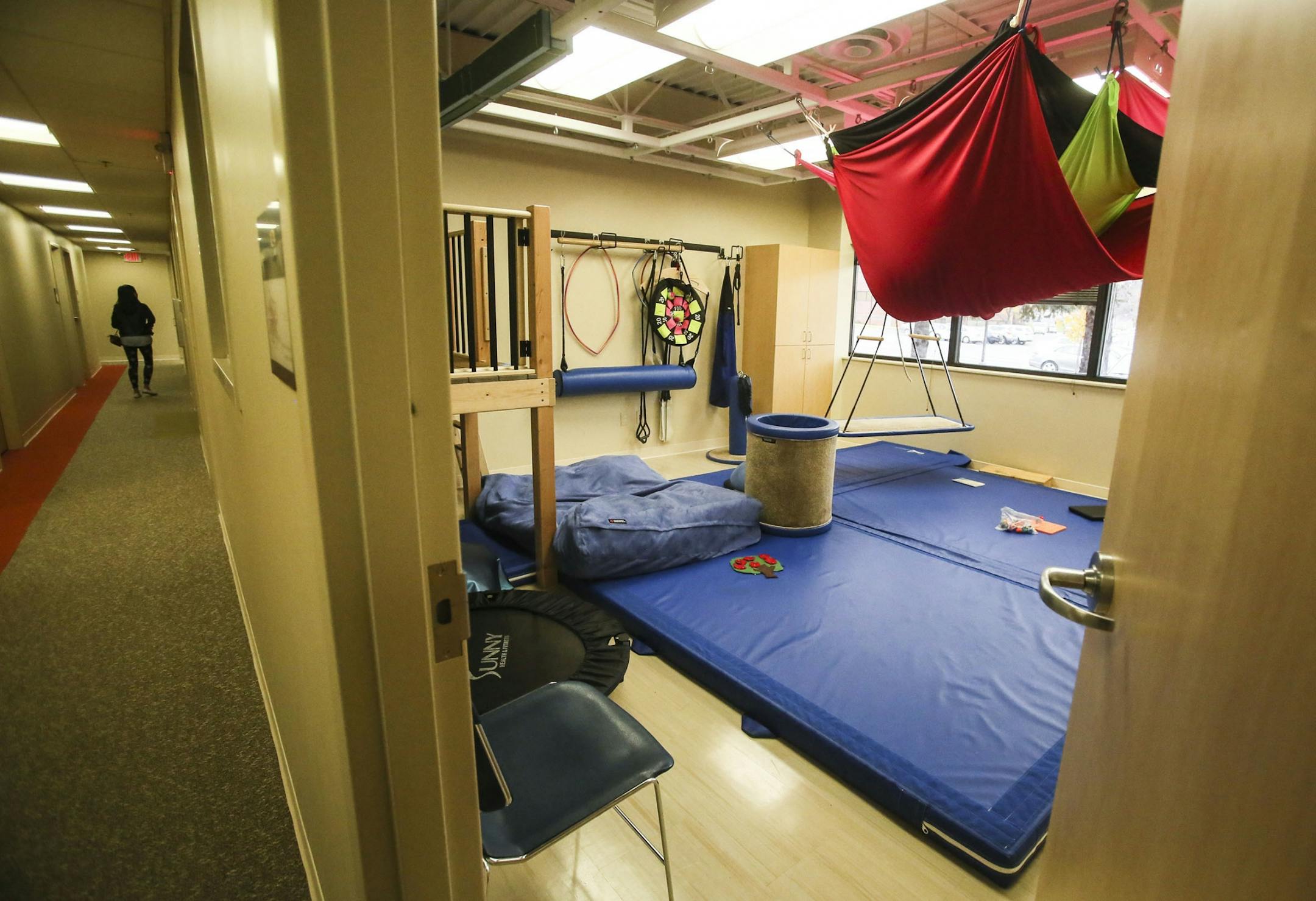 Local designer A.J. Paron-Wildes, whose son is autistic, had helped to design the space at Fraser Eden Prairie and seen Wednesday, Oct. 23, 2014, in Eden Prairie, MN. Here, a gymnasium is equipped with thick mats and other equipment helpful for chlidren with autism.