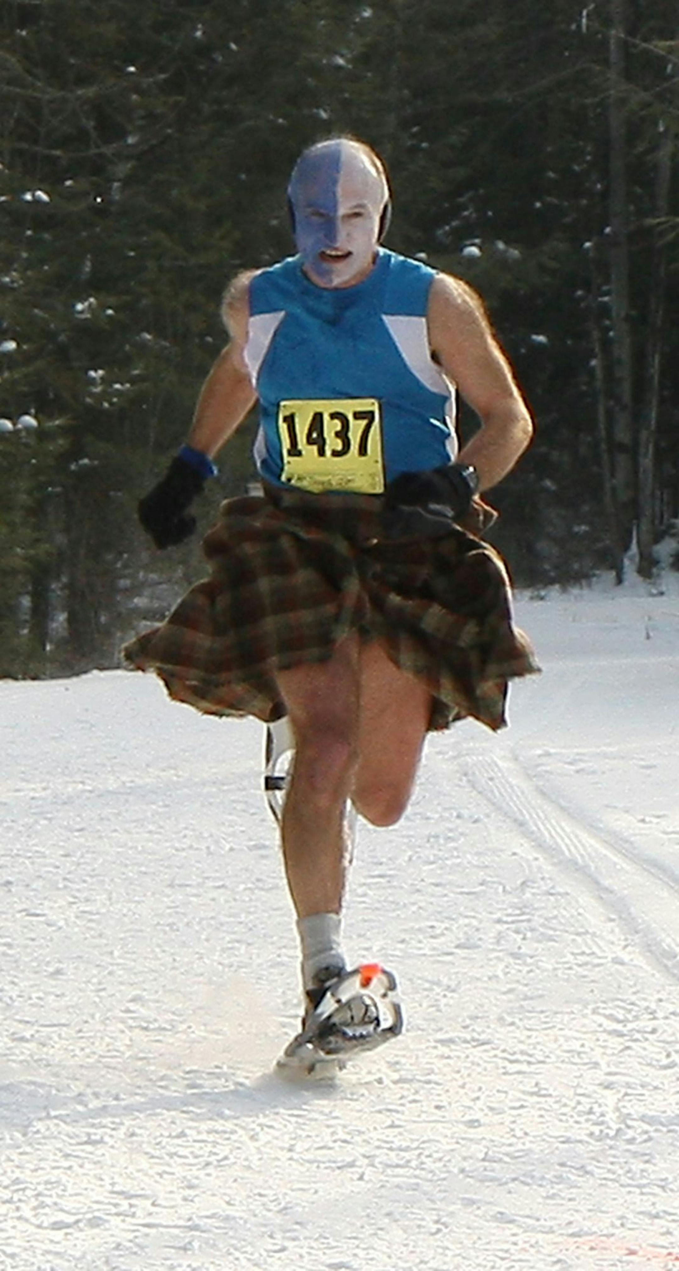Jim McDonell running a snowshoe race in Wisconsin, dressed as William Wallace in Braveheart.