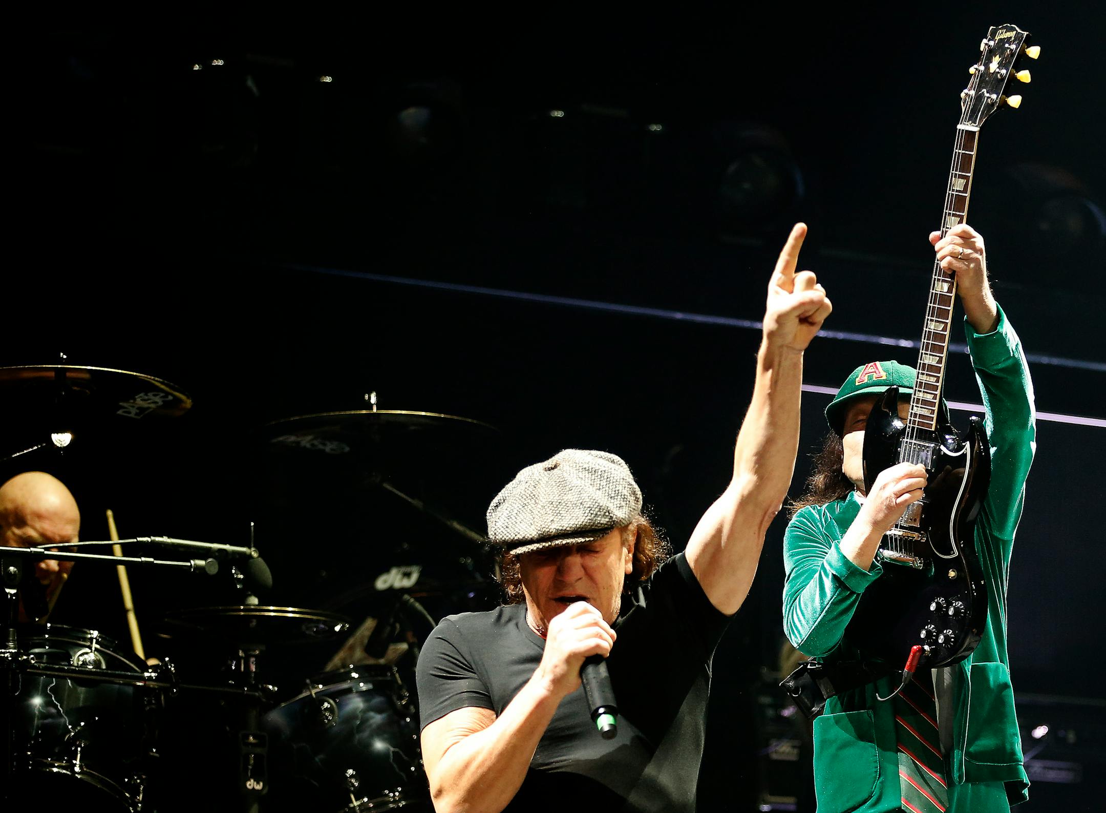 Lead singer Brian Johnson, lead guitar player Angus Young and drummer Chris Slade of AC/DC performed at the Xcel Energy Center on Sunday night. ] CARLOS GONZALEZ cgonzalez@startribune.com - February 14, 2016, New St. Paul, MN, Xcel Energy Center, AC/DC Concert