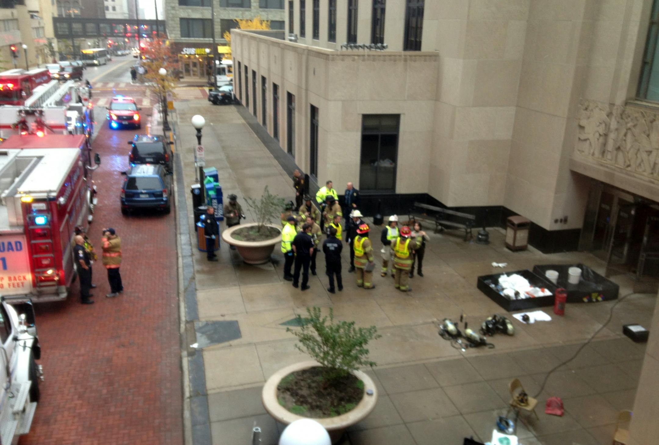 Scene outside the courthouse as authorities investigate a suspicious envelope.