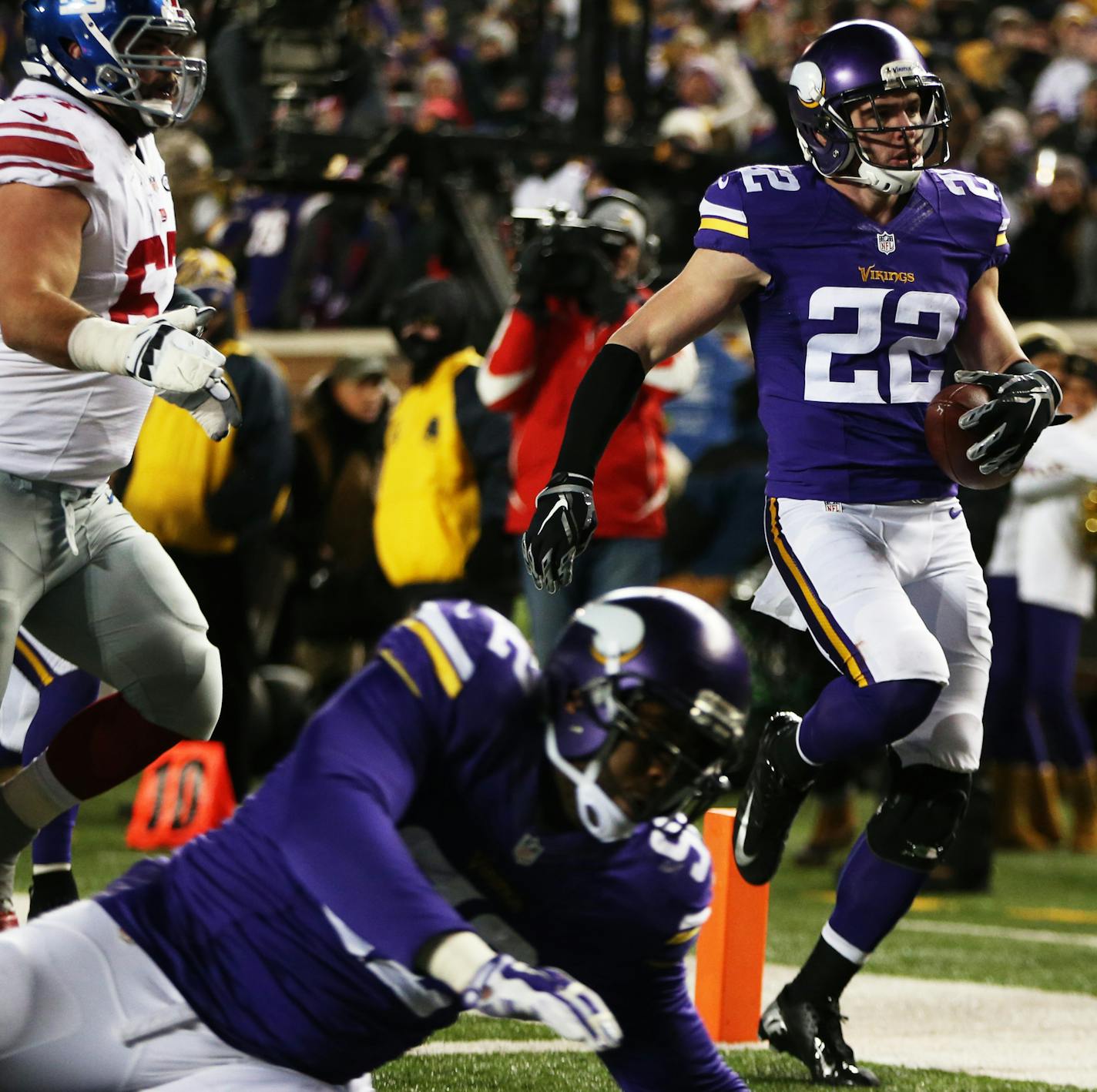 Vikings safety Harrison Smith ran 35 yards for a second quarter touchdown after intercepting a pass from Giants quarterback Eli Manning. ] Mark Vancleave - mark.vancleave@startribune.com * The New York Giants played the Minnesota Vikings on Sunday, Dec. 27, 2015 at TCF Bank Stadium.