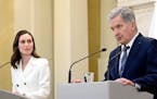 Finland’s President Sauli Niinisto and Prime Minister Sanna Marin, left, attend a news conference on Finland’s security policy decisions at the Pr