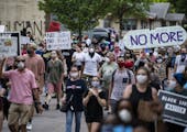 Protesters started marching toward the Minneapolis Police 3rd Precinct after gathering Tuesday, May 26, 2020. Four Minneapolis officers involved in th