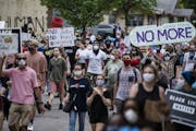 Protesters started marching toward the Minneapolis Police 3rd Precinct after gathering Tuesday, May 26, 2020. Four Minneapolis officers involved in th