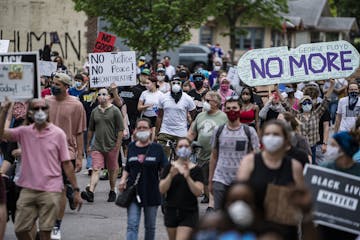 Protesters started marching toward the Minneapolis Police 3rd Precinct after gathering Tuesday, May 26, 2020. Four Minneapolis officers involved in th