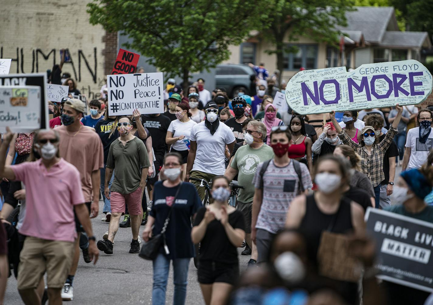 Protesters started marching toward the Minneapolis Police 3rd Precinct after gathering Tuesday, May 26, 2020. Four Minneapolis officers involved in the arrest of George Floyd, a black man who died in police custody, were fired Tuesday, hours after a bystander's video showed an officer kneeling on the handcuffed man's neck, even after he pleaded that he could not breathe and stopped moving. (Richard Tsong-Taatarii/Star Tribune via AP)