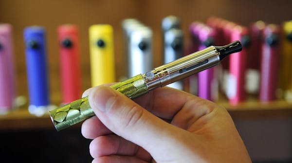 The electronic cigarette consists of a battery on the bottom and a bottom-coiled tank on top. Electronic cigarettes are growing in popularity, but con
