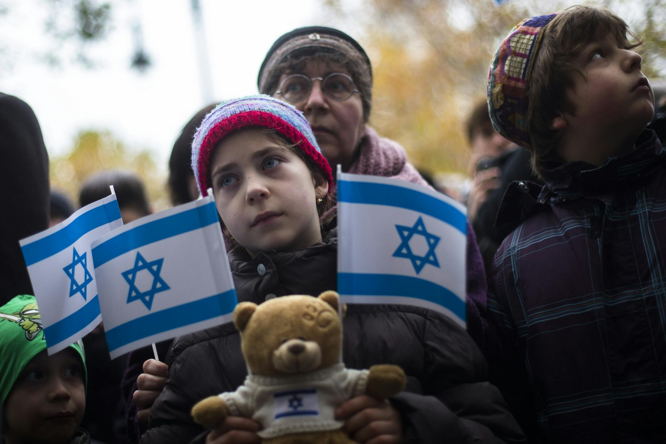 Demonstrators with Israeli flags attend a demonstration to support Israel in Berlin, Sunday, Nov. 18, 2012. About 200 people attend the demonstration under the title ' Solidarity with Israel - liberate Gaza from the Hamas'.