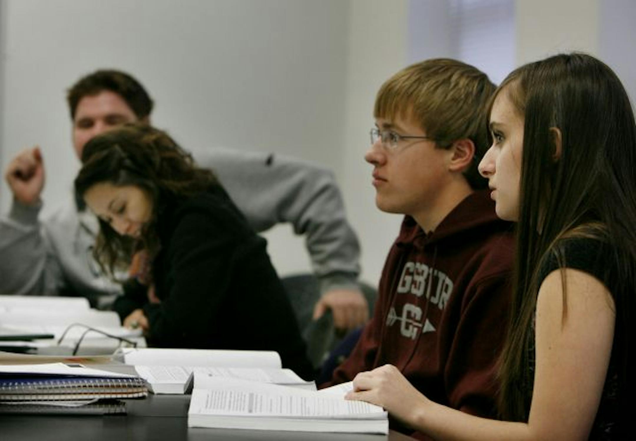 Ponce de Leon, right, in intermediate Spanish, is among the quarter of Augsburg undergrads who are students of color.