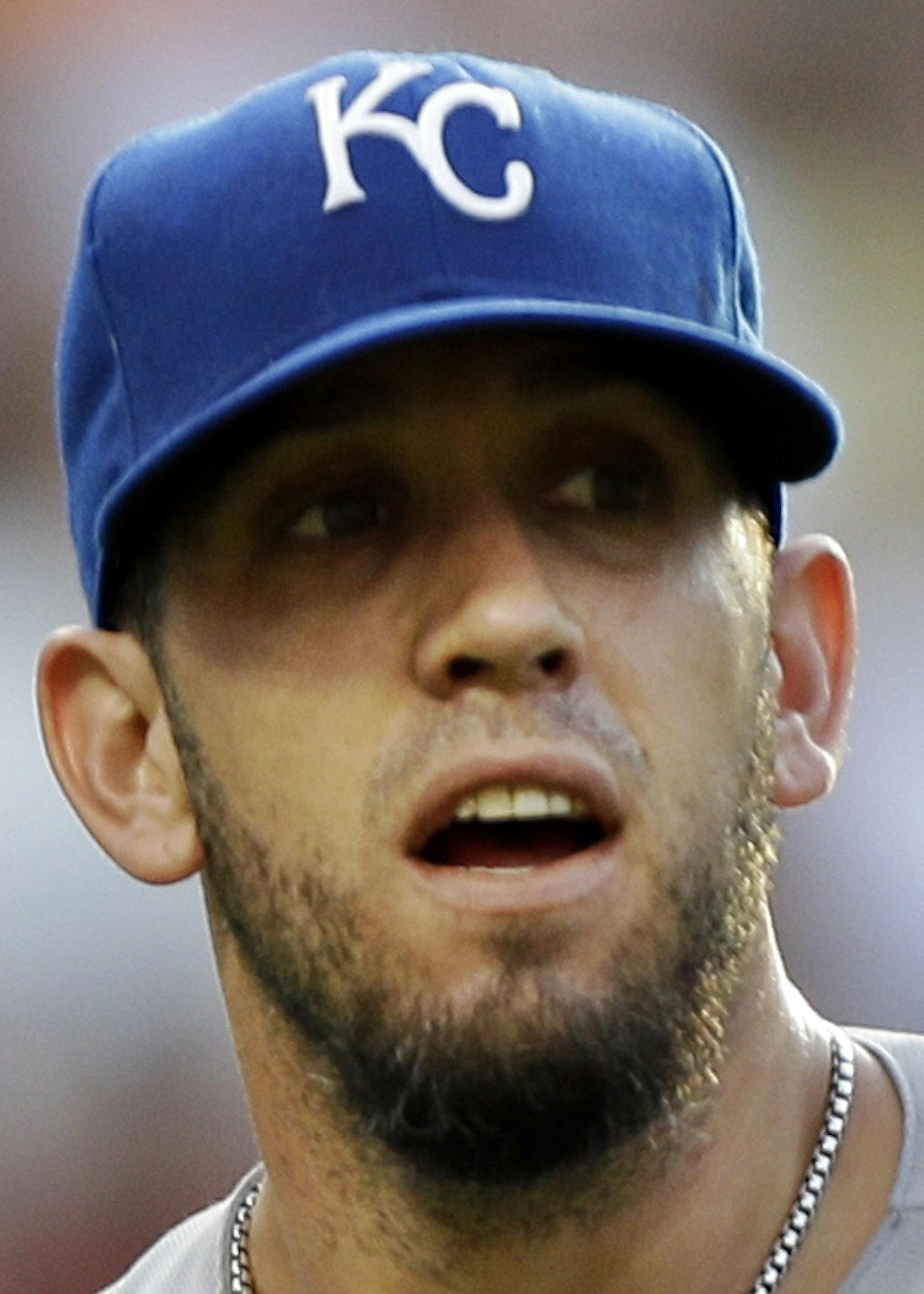 Kansas City Royals starting pitcher James Shields walks off the field after getting out of a bases-loaded jam in the third inning of a baseball game against the Cleveland Indians Monday, June 17, 2013, in Cleveland. (AP Photo/Mark Duncan)