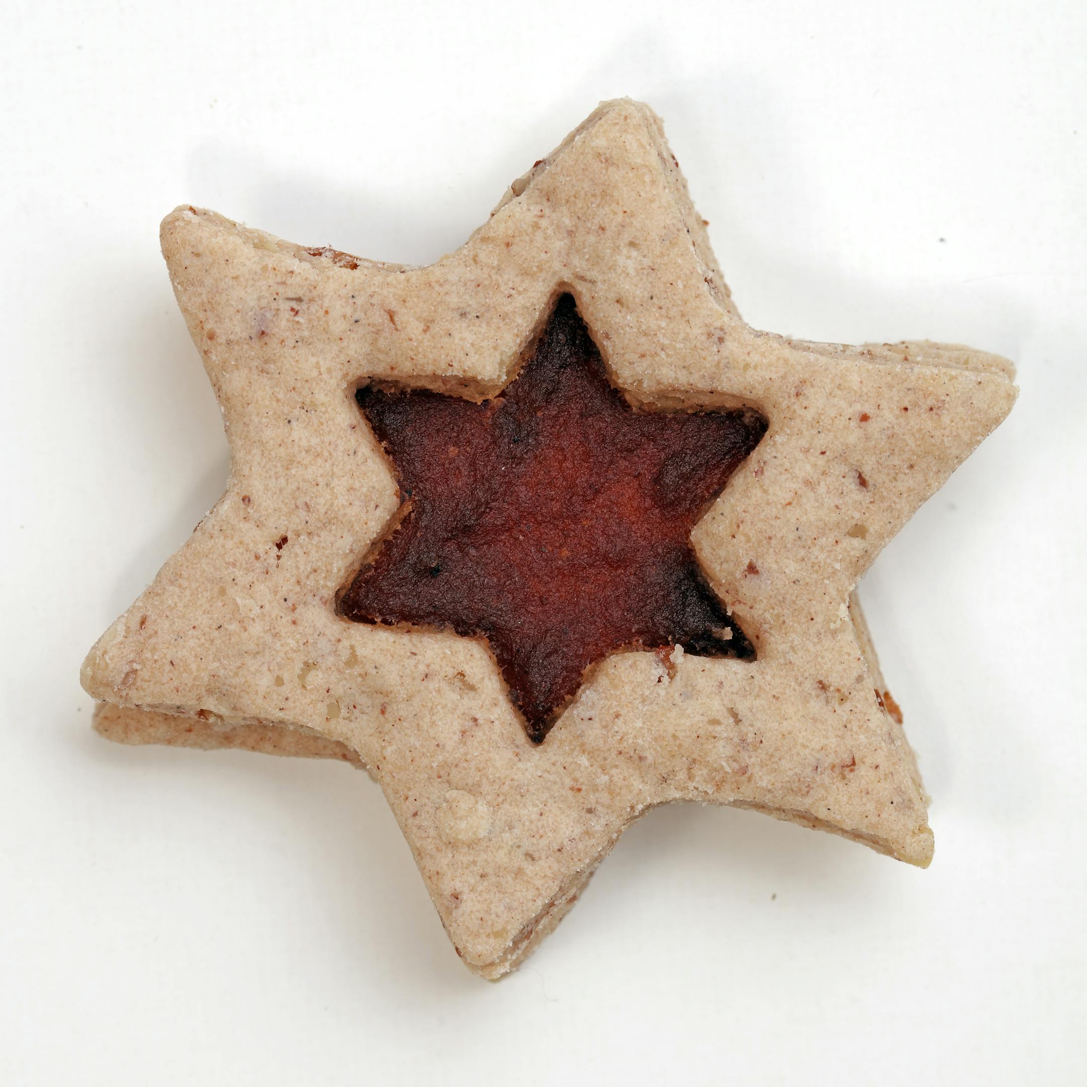 Apple Cardamom Pecan Star Cookies (from baker Jana Freiband). ] The winner and four finalists in the 2015 Taste Holiday Cookie (Cooky) Contest: Chocolate Decadence Cookies (from baker Elaine Prebonich), Kit Kat Christmas Bars (from baker Julie Olson), Cardamom Orange Zest Sugar Cookies (from baker Jeanne Nordstrom), Bacon Cornmeal Venetos (by bakers Julie Bollmann, Wendy Kleiser, Joan Koller, Geri Olson and Mary Urbas) and winner Apple Cardamom Pecan Star Cookies (from baker Jana Freiband).