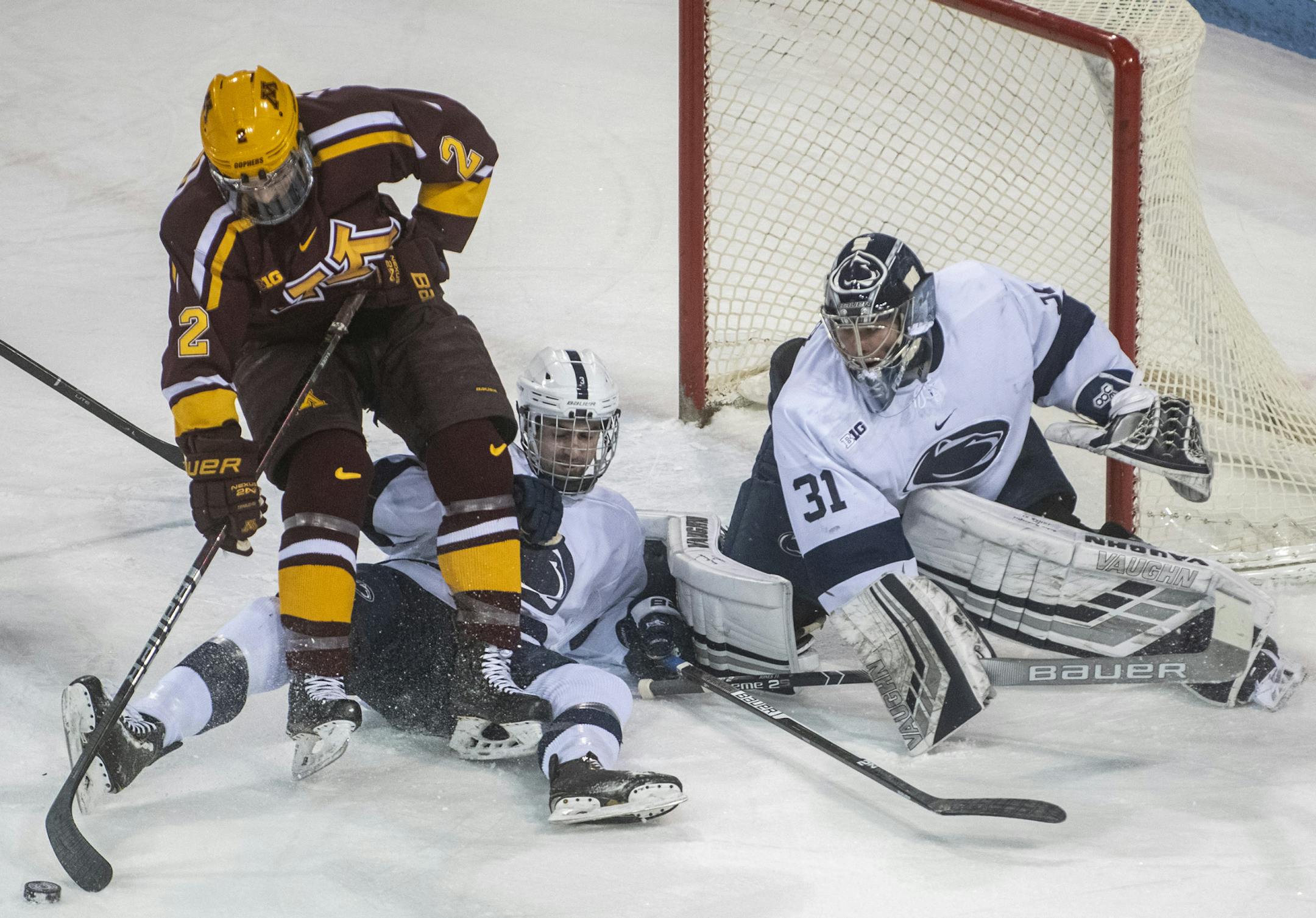 Minnesota defenseman Jack Sadek (2) attempts to play the puck during a game against Penn State at Pegula Ice Arena. Penn State won the game 7-2 on Friday, Feb. 8, 2019. Mandatory credit: Eric Firestine / Daily Collegian