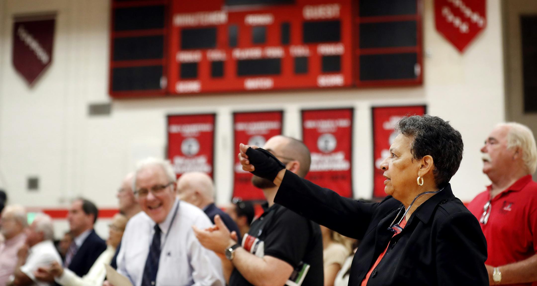 St. Paul Central High School principal Mary Mackbee stood as sung along as the school song was played Tuesday September 6, 2016 in St. Paul, MN.] St. Paul Central kicks off 150th year celebration with a rally on the front steps, dignitaries, and the school band, cheerleaders. Jerry Holt / jerry. Holt@Startribune.com
