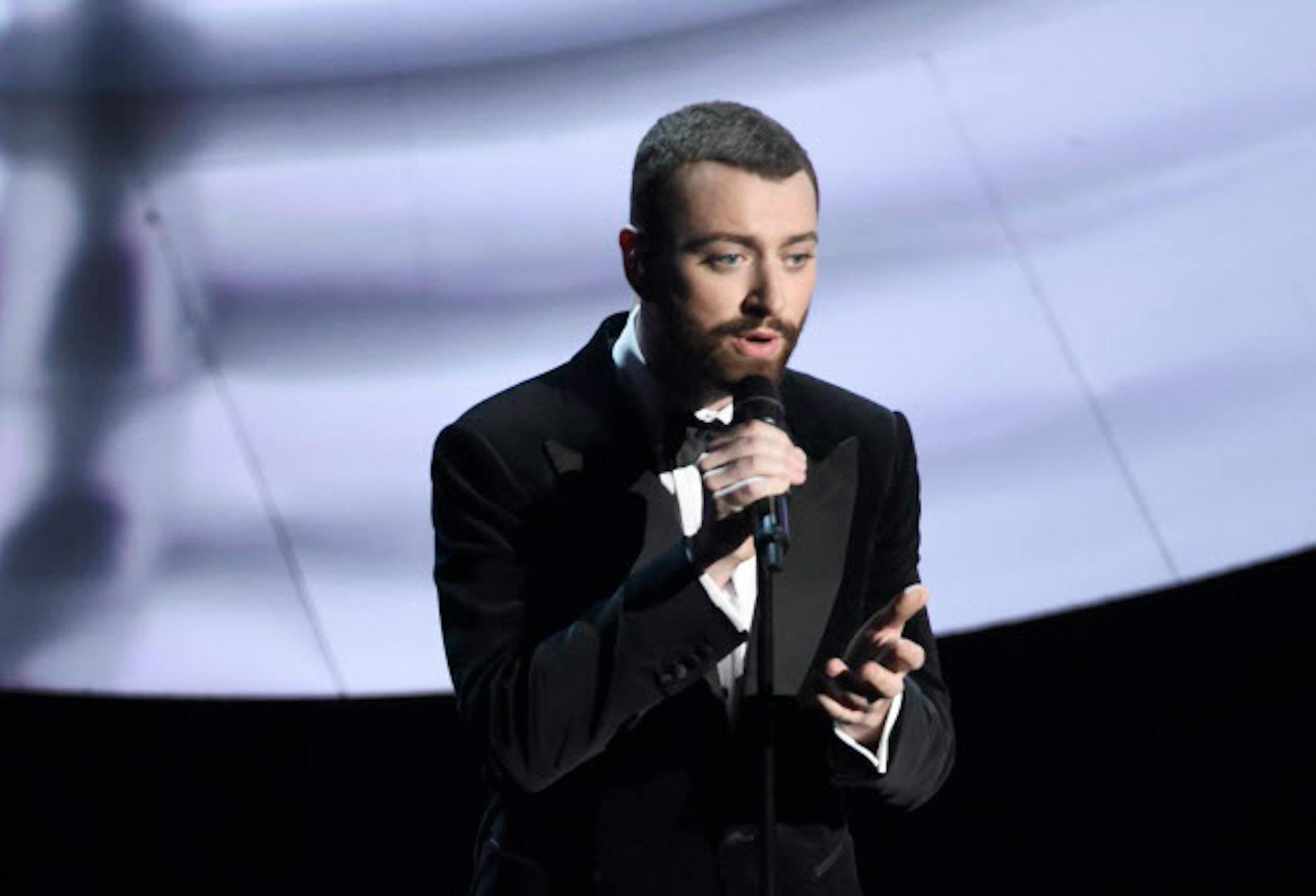 Sam Smith performs "Writings on the Wall" that is nominated for best original song from "Spectre" at the Oscars on Sunday, Feb. 28, 2016, at the Dolby Theatre in Los Angeles. (Photo by Chris Pizzello/Invision/AP)