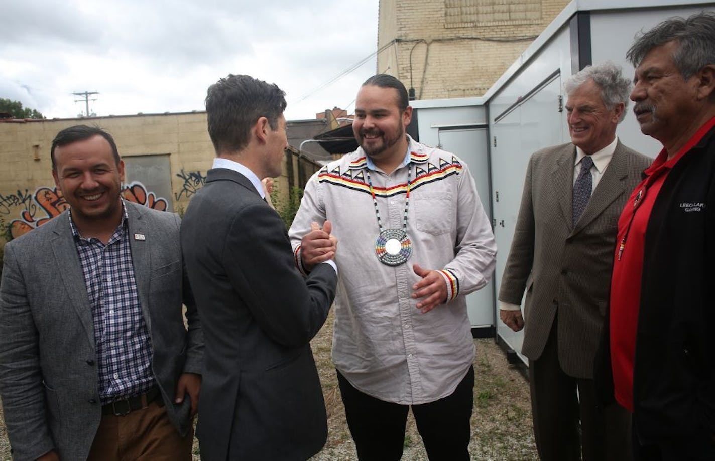 Sam Strong, secretary of the Red Lake Nation shook hands with Minneapolis Mayor Jacob Frey after announcing to the press that the Red Lake tribe would be willing to offer their land on Cedar Ave. as a temporary location for the people at the homeless encampment.