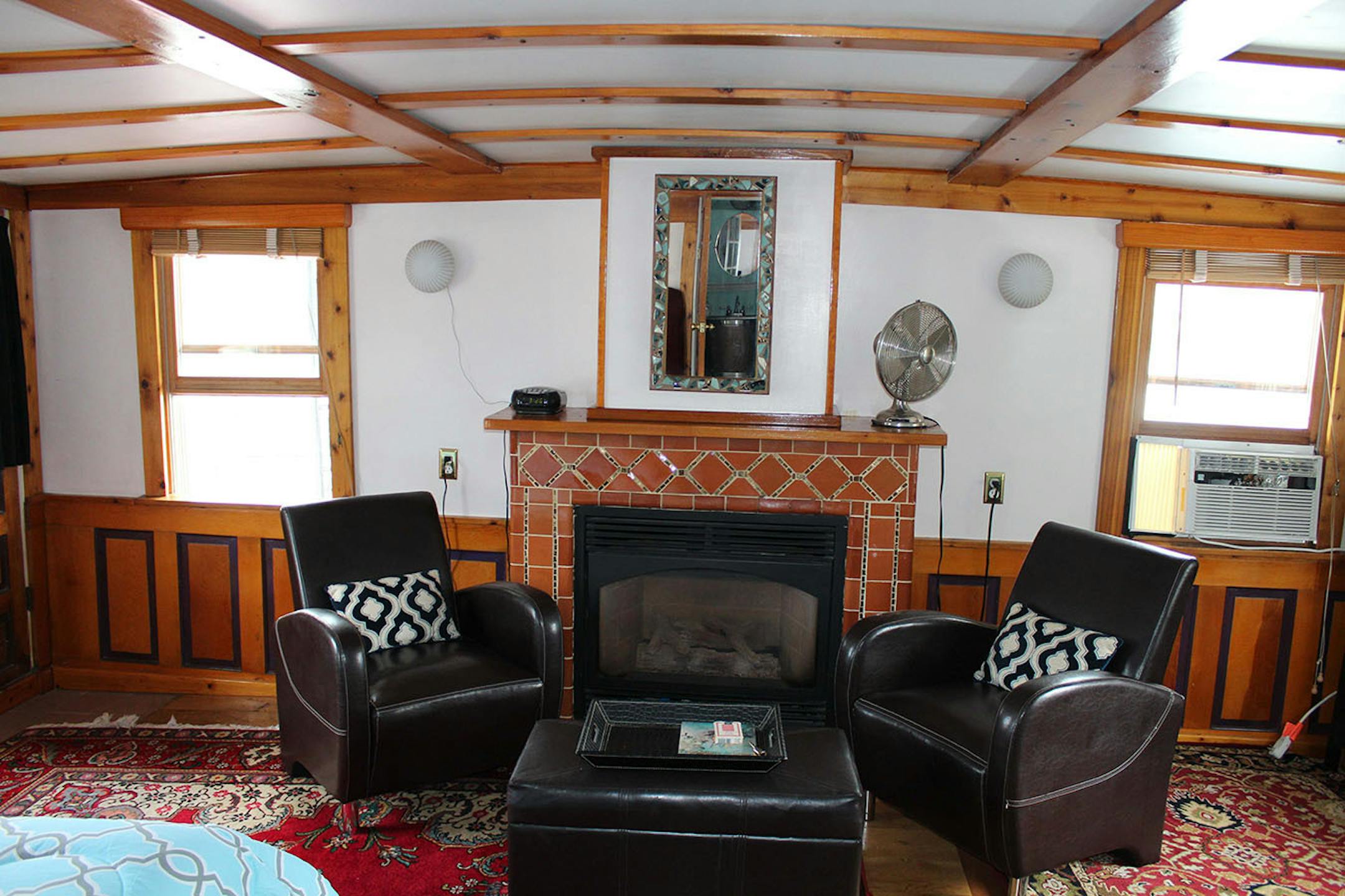 Tiled fireplace sitting area in the Master;s Quarters.