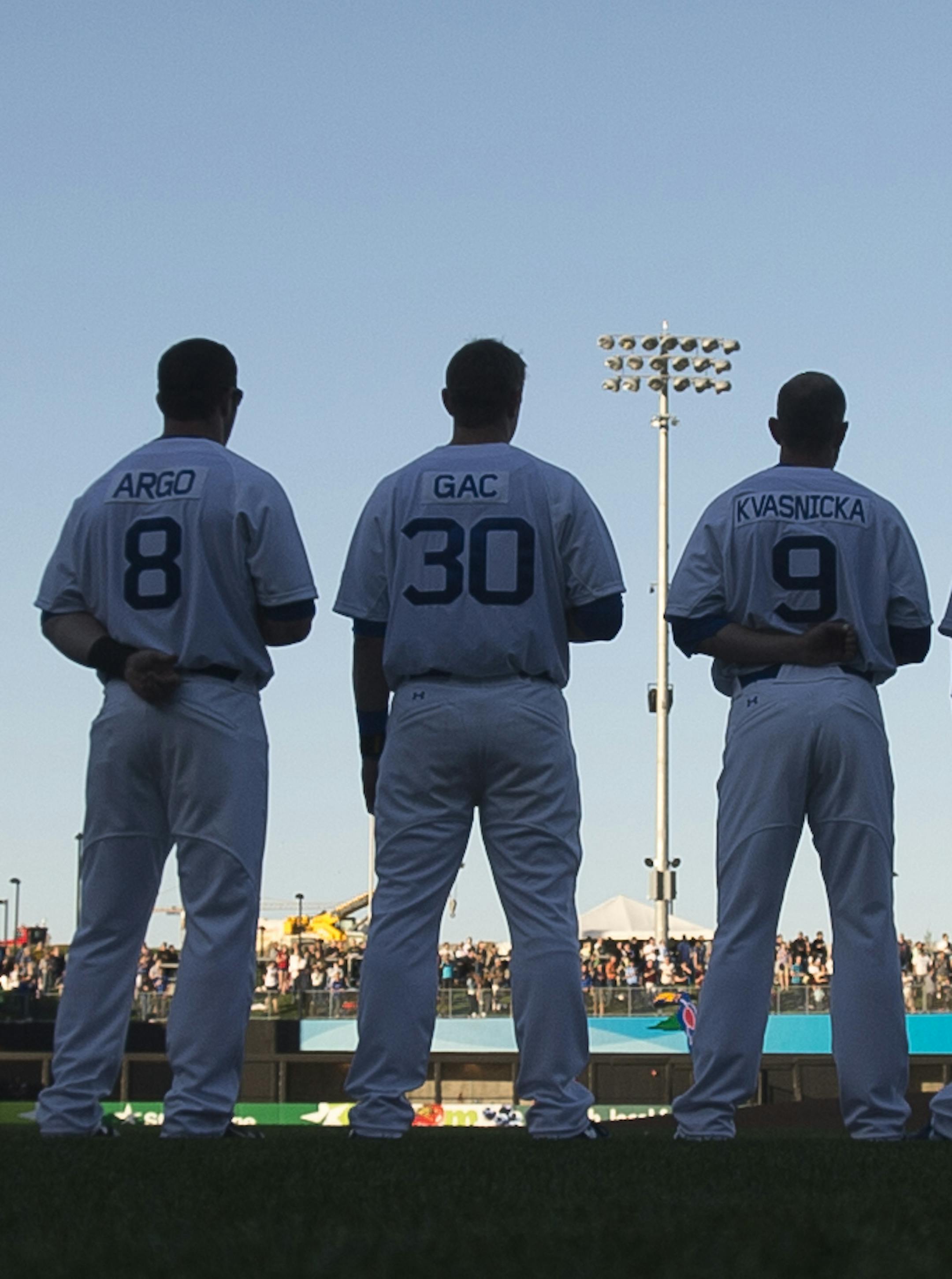 St. Paul Saints players lined up along the first base line before the start of Thursday night's home opener. ] Aaron Lavinsky &#x2022; aaron.lavinsky@startribune.com The St. Paul Saints hold their season opener against the Fargo-Moorhead Redhawks at brand-new CHS Field on Thursday, May 21, 2015.