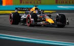 Red Bull driver Max Verstappen of the Netherlands steers his car during the Sprint race qualifying session at the Formula One Miami Grand Prix on Frid