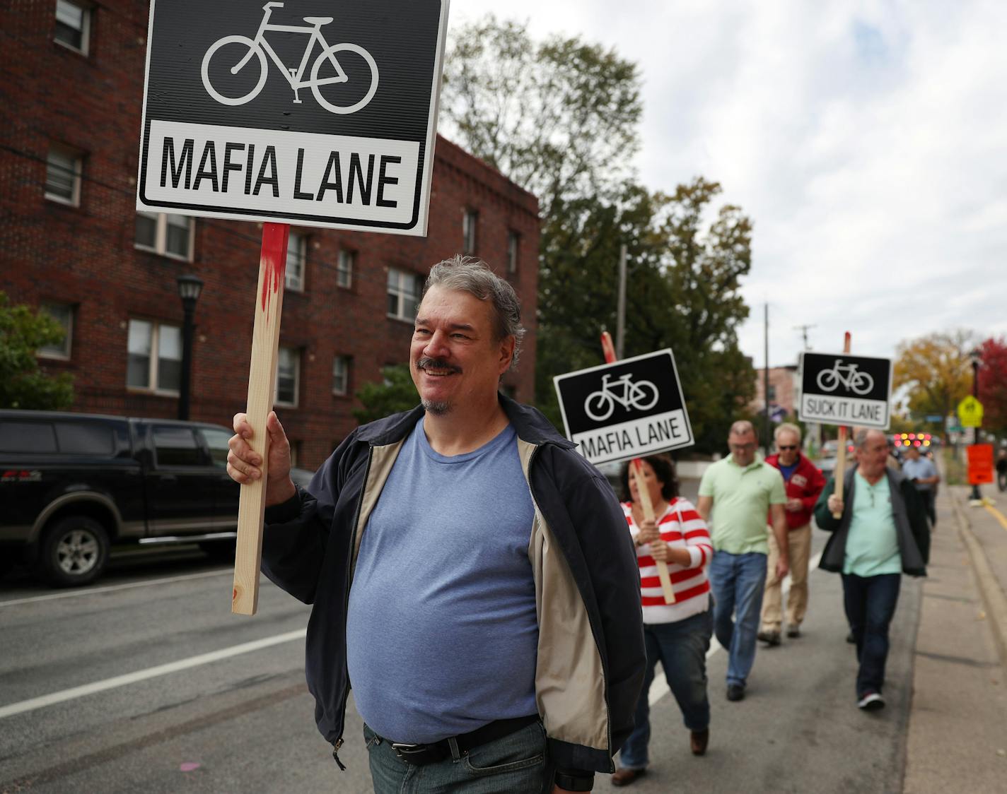 Greg Kline led protesters down bike lanes on W. 26th Street in Minneapolis to make their feelings known.