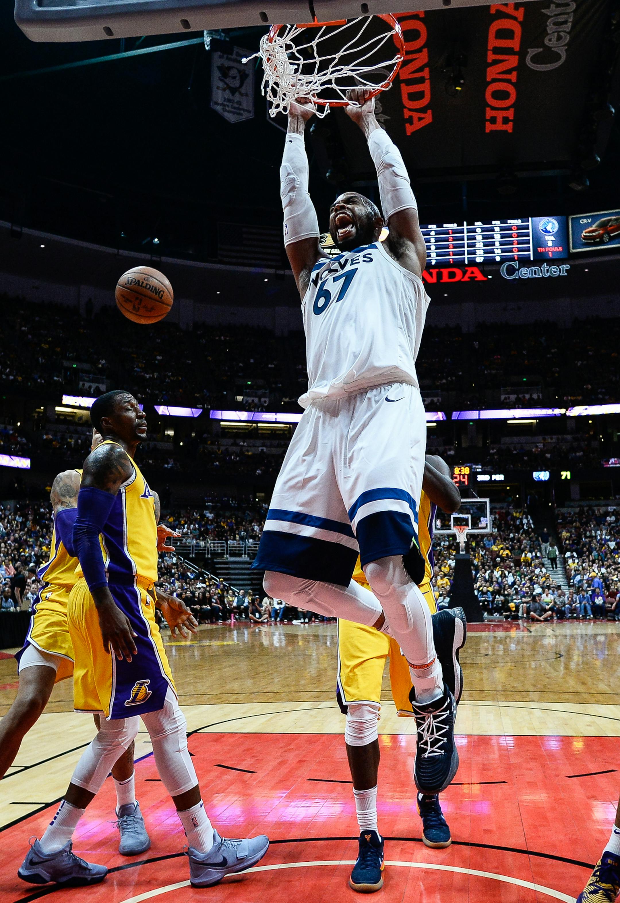 Minnesota Timberwolves forward Taj Gibson (67) yelled as he dunked the ball in the fourth quarter against the Los Angeles Lakers. ] AARON LAVINSKY ï aaron.lavinsky@startribune.com The Minnesota Timberwolves played the Los Angeles Lakers in their first game of the NBA preseason on Saturday, Sept. 30, 2017 at Honda Center in Anaheim, California.