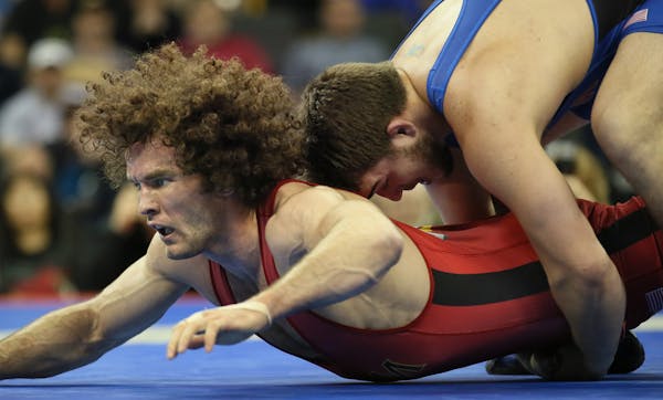 Olympic Wresting Trials Championships (IN THIS PHOTO) Minnesotans Jordan Holm (left) and Chas Betts battle it out during the championship round of the