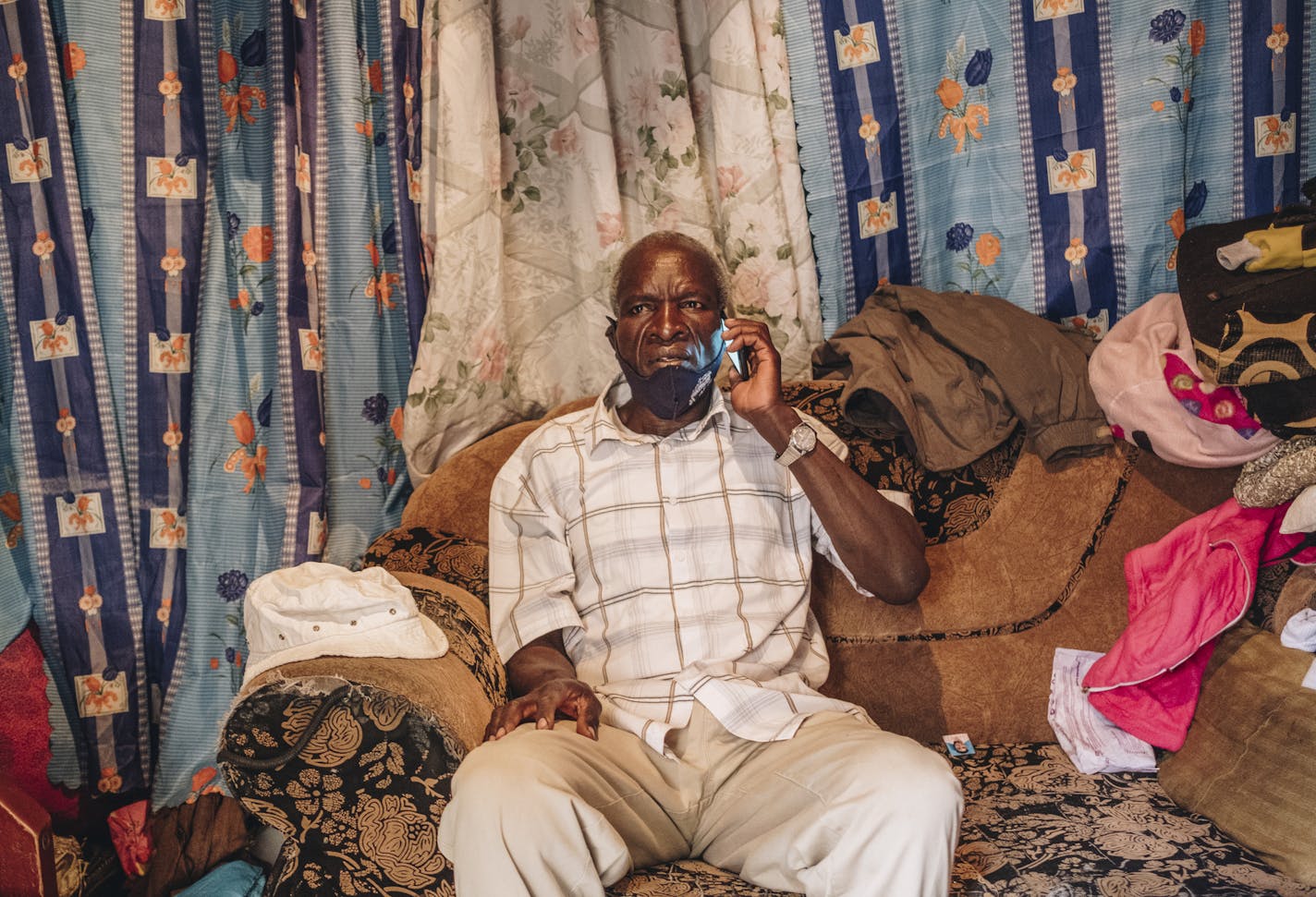 Thomas Wuoto, who had to borrow HIV medications from his wife and went without any for 10 days during lockdown, in Nairobi, June 24, 2020. Lockdowns and supply-chain disruptions are threatening progress against tuberculosis as well as HIV and malaria. (Khadija Farah/The New York Times)