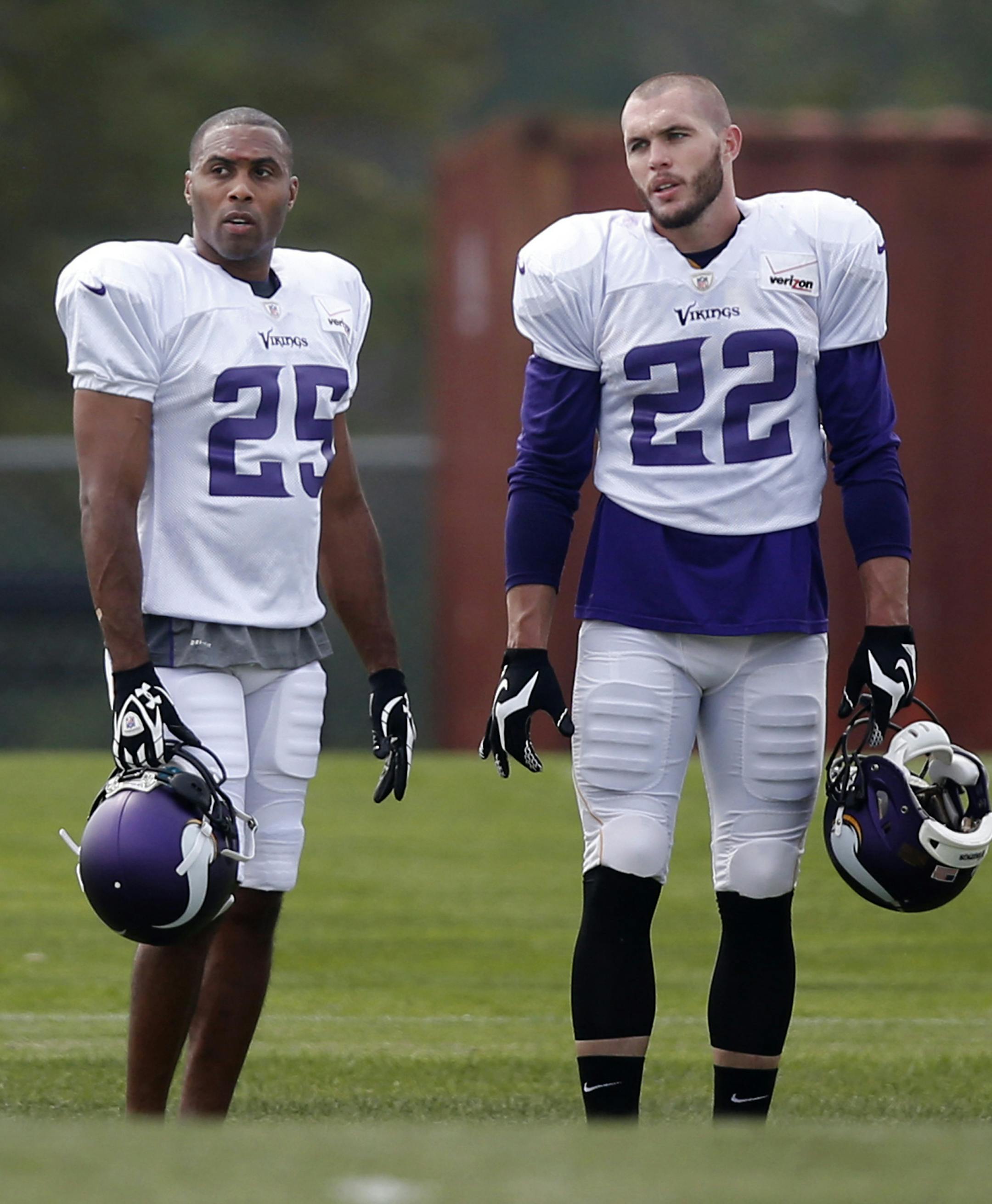 Newly acquired Vikings safety Chris Crocker, left, stood with the team’s best safety, Harrison Smith, during the afternoon practice on Monday in Mankato. The Vikings brought in Crocker to contend for a spot opposite of Smith this fall.