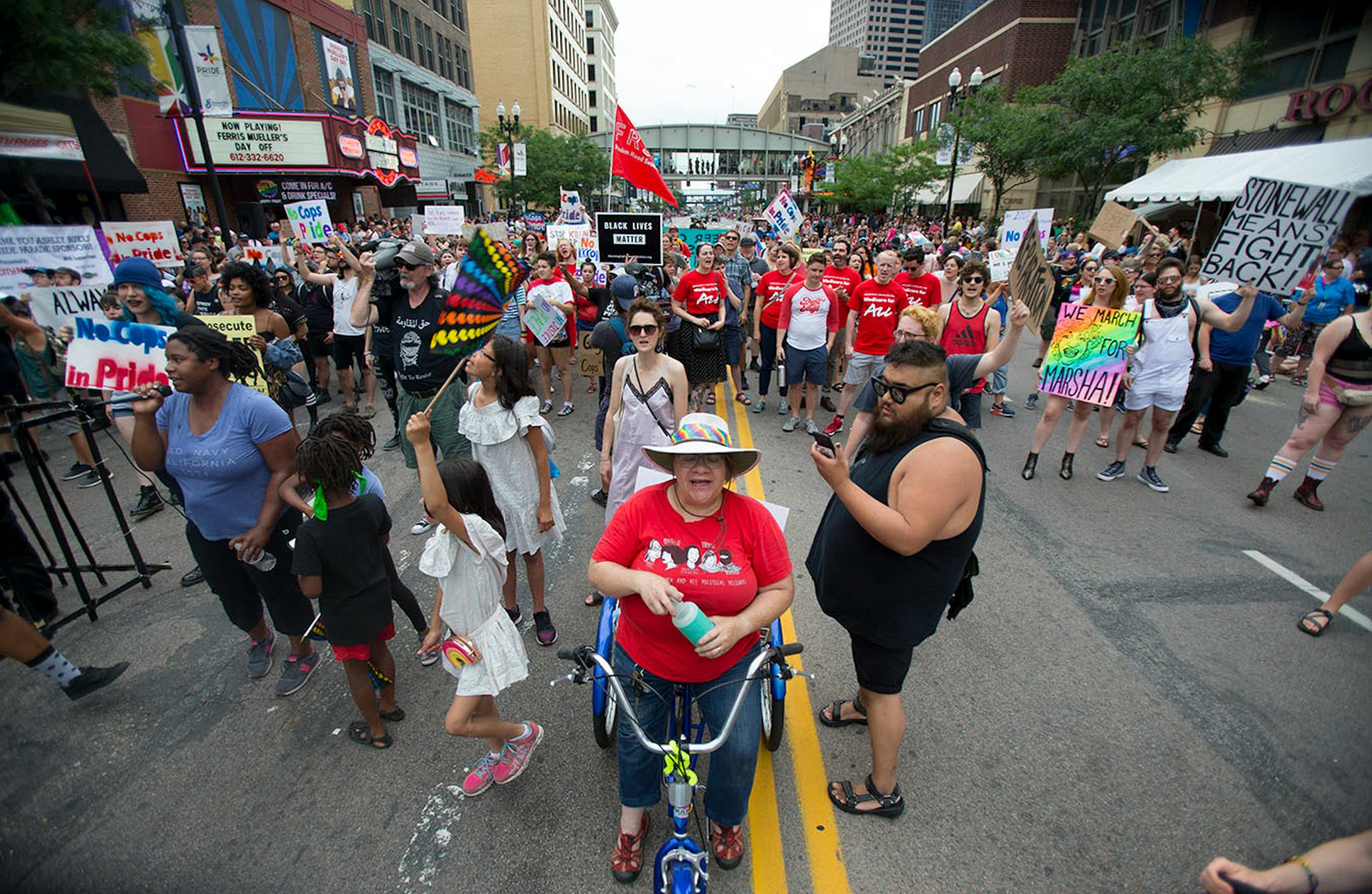 Protestors marched ahead of the pride parade on Sunday to call attention to misconduct by police and the death of black community members.