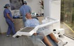 ** FOR USE SUNDAY, AUG. 23 AND THEREAFTER ** In this photo made June 26, 2009, Bill Jones, of Dallas, Texas, relaxes as he waits to have a root canal 