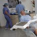** FOR USE SUNDAY, AUG. 23 AND THEREAFTER ** In this photo made June 26, 2009, Bill Jones, of Dallas, Texas, relaxes as he waits to have a root canal 
