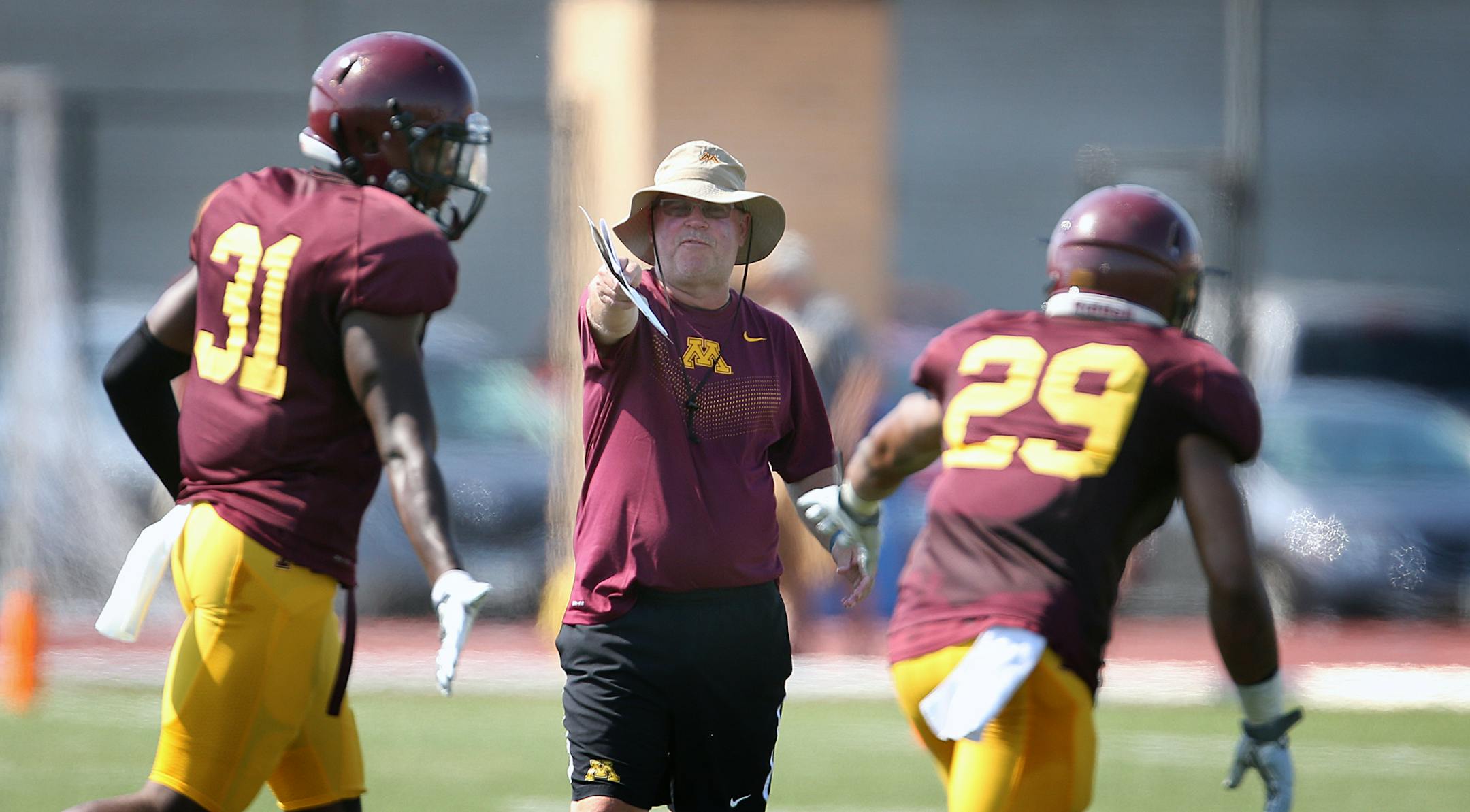 Gophers coach Jerry Kill instructed his players during Saturday's scrimmage at Concordia (St. Paul).